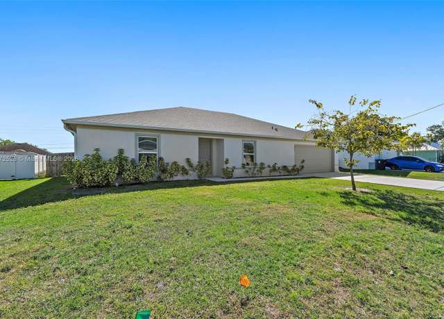 Property at 421 NW Biltmore St, Port St. Lucie, FL 34983, 4 beds, 2 baths