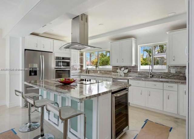 Property at 416 N Rainbow Dr, Hollywood, FL 33021, 5 beds, 3 baths