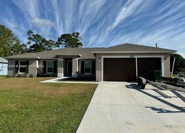 Property at 1901 SW Swift Ave, Port St. Lucie, FL 34953, 4 beds, 2 baths