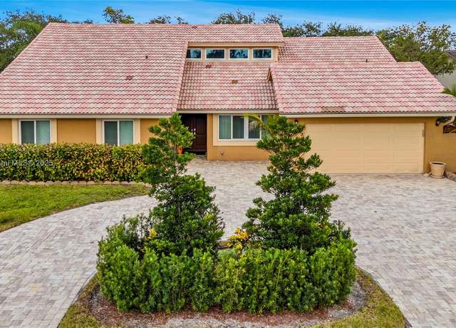 Property at 663 NW 107th Ln, Coral Springs, FL 33071, 4 beds, 2.5 baths