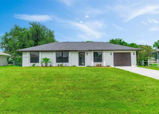 Property at 3206 12 St W, Lehigh Acres, FL 33971, 3 beds, 2 baths