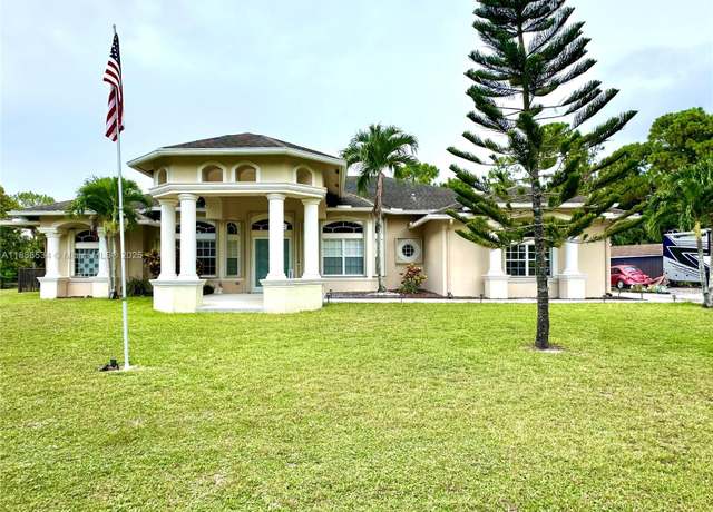 Property at 13628 N 71st Pl N, West Palm Beach, FL 33412, 4 beds, 3 baths