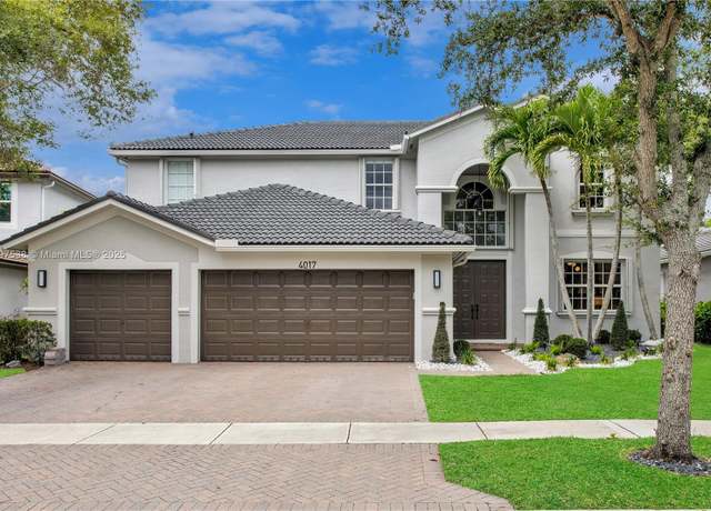 Property at 4017 W Gardenia Ave, Weston, FL 33332, 5 beds, 4 baths