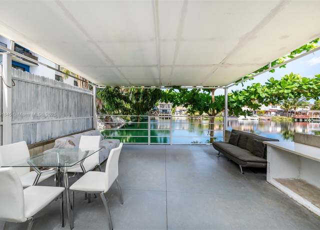 Property at 7000 W 15th Ct, Hialeah, FL 33014, 2 beds, 1.5 baths