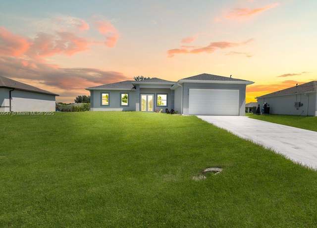 Property at 3210 22nd St SW, Lehigh Acres, FL 33976, 3 beds, 2 baths