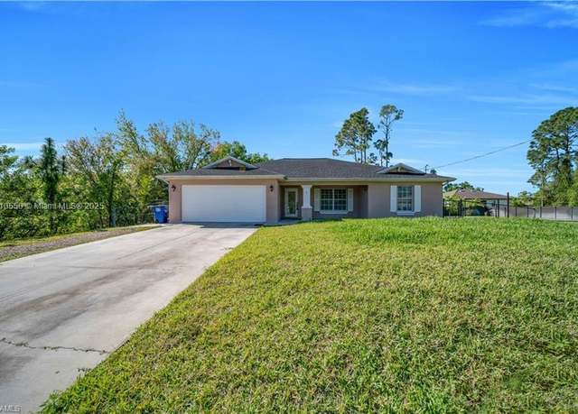Property at 3101 15th St W, Lehigh Acres, FL 33971, 4 beds, 2 baths