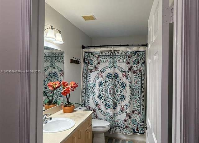 Property at 5552 NW 125th Ter, Coral Springs, FL 33076, 4 beds, 2.5 baths