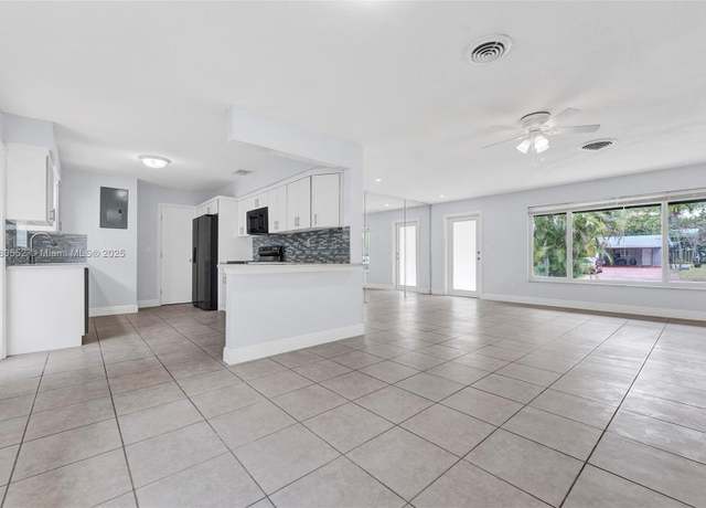 Property at 5709 Van Buren St, Hollywood, FL 33023, 4 beds, 3 baths