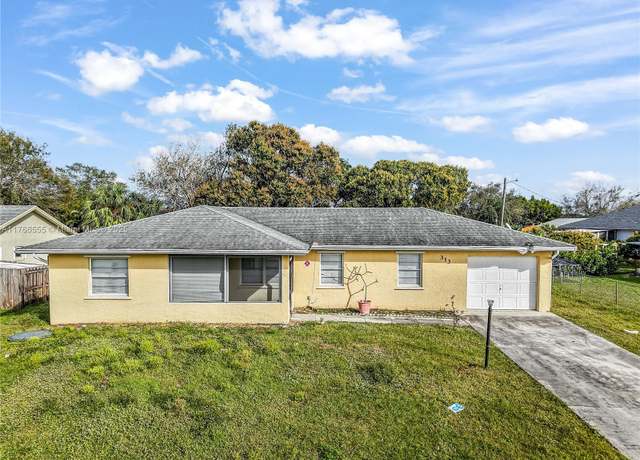 Property at 313 NW Dorchester St, Port St. Lucie, FL 34983, 3 beds, 2 baths