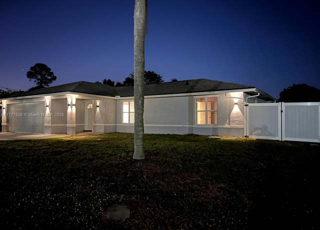Property at 1061 SE Lansdowne Ave, Port St. Lucie, FL 34983, 3 beds, 2 baths
