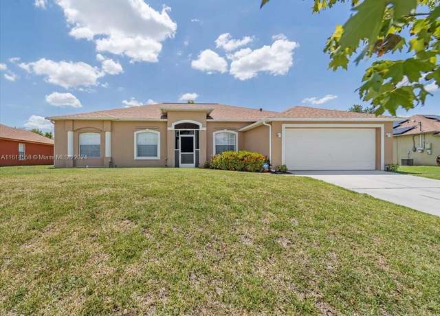Property at 821 Carlfield Ave, Lehigh Acres, FL 33971, 3 beds, 2 baths