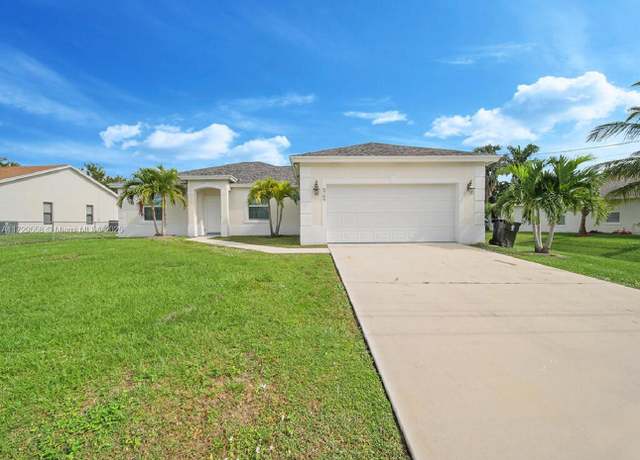 Property at 6709 NW Dorothy St, Port St. Lucie, FL 34983, 4 beds, 3.5 baths