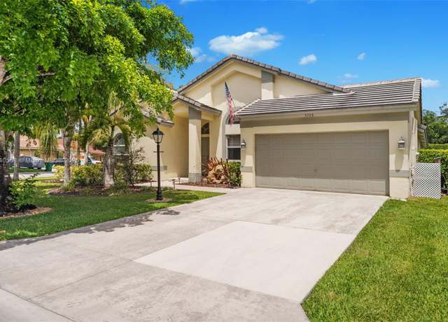 Property at 5708 NW 47th Ct, Coral Springs, FL 33067, 4 beds, 2 baths