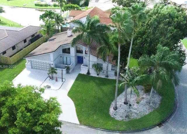 Property at 680 NW 111th Way, Coral Springs, FL 33071, 4 beds, 2 baths
