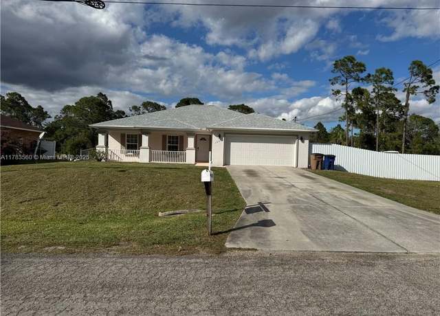 Property at 1065 Lilac St E, Lehigh Acres, FL 33974, 3 beds, 2 baths