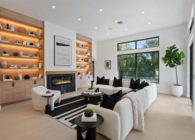 Property at 1201 Breakers West Blvd, West Palm Beach, FL 33411, 5 beds, 3.5 baths
