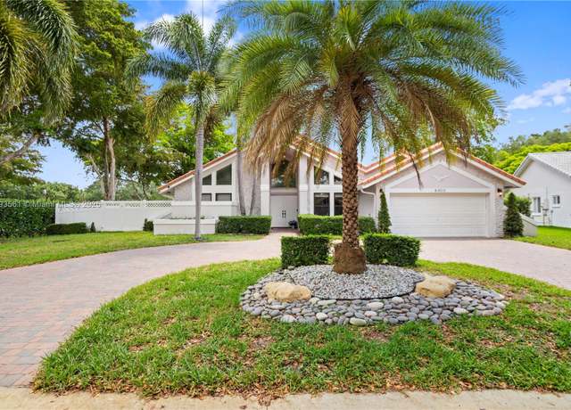 Property at 8400 NW 47th Dr, Coral Springs, FL 33067, 4 beds, 2 baths