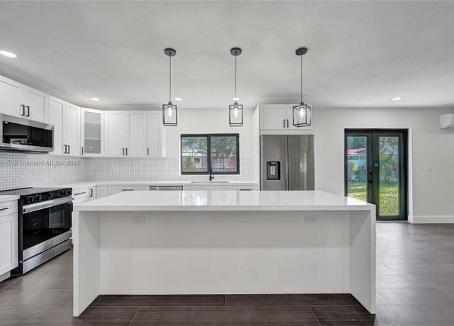 Property at 4879 NW 2nd Ct, Plantation, FL 33317, 4 beds, 3 baths