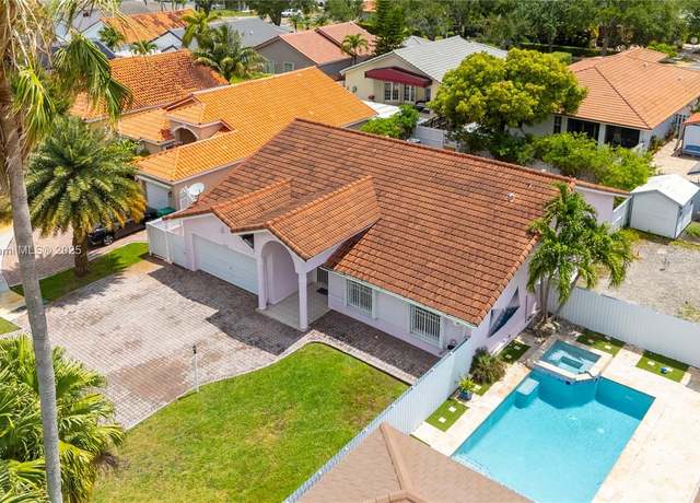 Property at 15103 NW 89th Ct, Miami Lakes, FL 33018, 3 beds, 2 baths