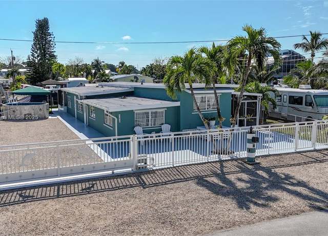 Property at 354 Vaca Rd, FL 33037, 5 beds, 3 baths