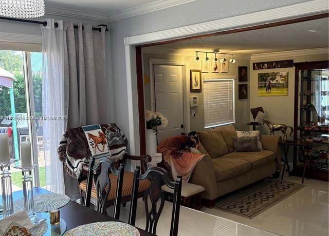 Property at 7430 Buchanan St, Hollywood, FL 33024, 4 beds, 2 baths