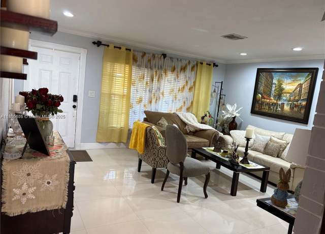 Property at 7430 Buchanan St, Hollywood, FL 33024, 4 beds, 2 baths