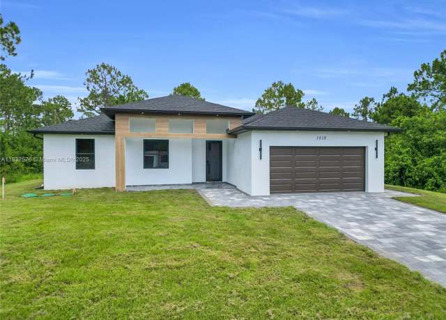 Property at 1018 Calvin Ave, Lehigh Acres, FL 33972, 4 beds, 3 baths