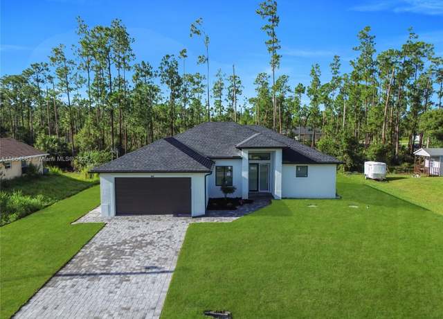 Property at 4002 E 9th St, Lehigh Acres, FL 33972, 3 beds, 2 baths