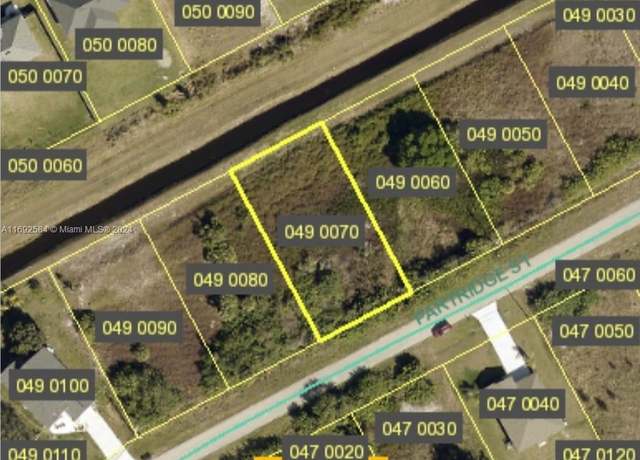 Property at 209 Partridge St, Lehigh Acres, FL 33974