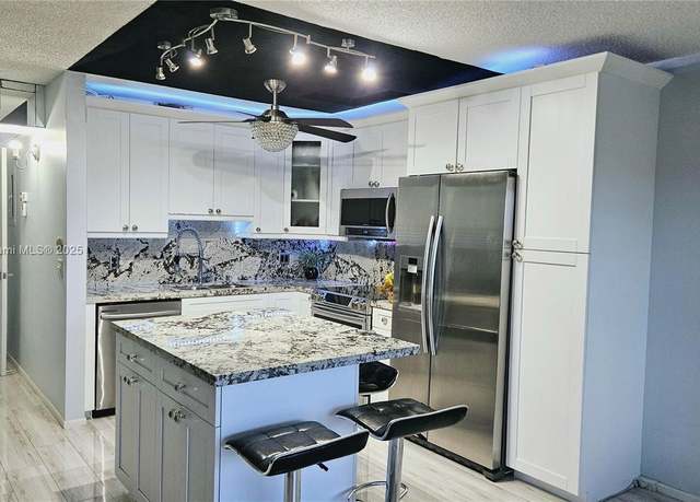 Property at 1401 SW 134th Way Unit 412C, Pembroke Pines, FL 33027, 1 bed, 1.5 baths