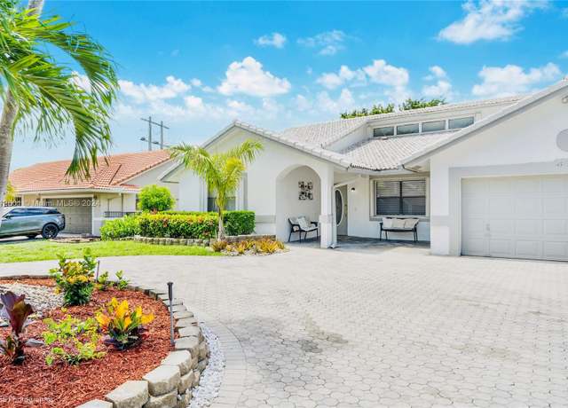 Property at 8666 NW 47th Dr, Coral Springs, FL 33067, 4 beds, 2 baths