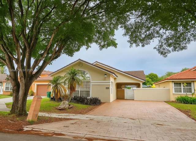 Property at 15126 NW 90th Ct, Miami Lakes, FL 33018, 3 beds, 2.5 baths