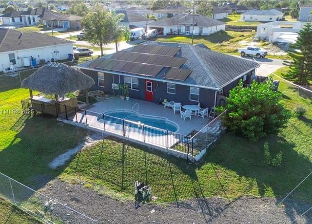 Property at 1020 Chaplin Ave, Lehigh Acres, FL 33971, 3 beds, 2 baths