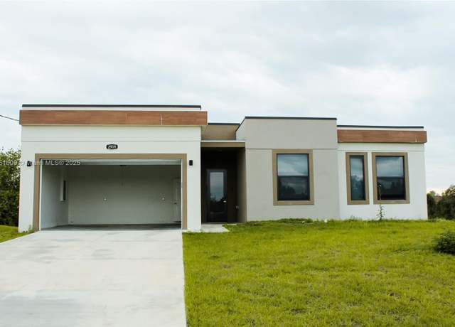 Property at 2919 65th St. West, Lehigh Acres, FL 33971, 3 beds, 2 baths