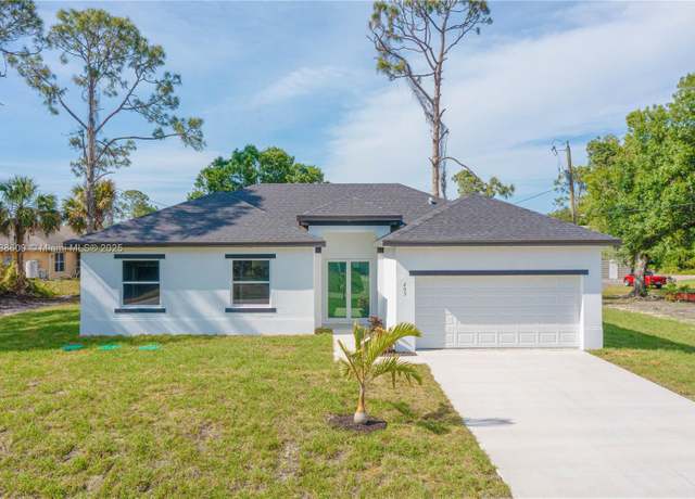 Property at 203 E 7th St, Lehigh Acres, FL 33972, 3 beds, 2 baths