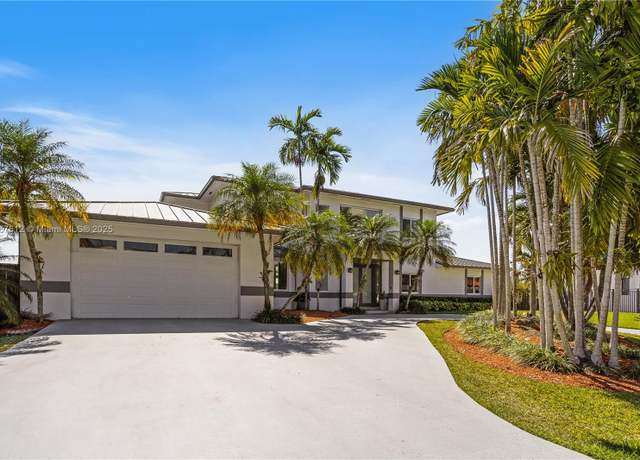 Property at 9880 SW 148th Ter, Miami, FL 33176, 7 beds, 5 baths