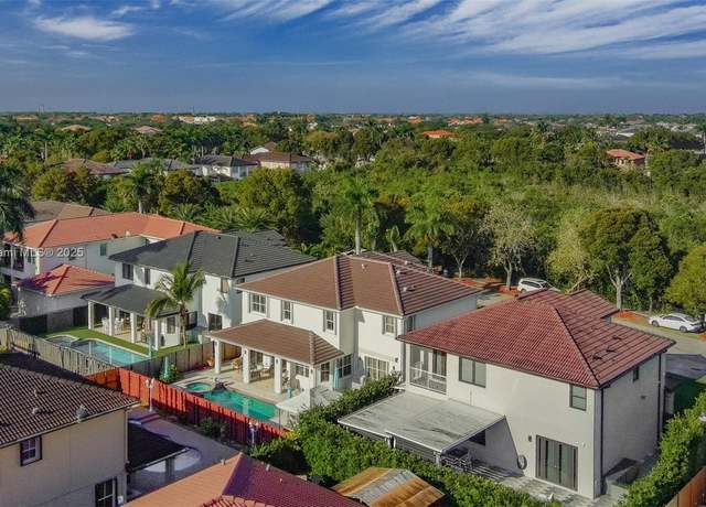 Property at 1411 SW 149th Pl, Miami, FL 33194, 5 beds, 4 baths