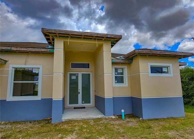 Property at 4111 SW 22nd, Lehigh Acres, FL 33976, 3 beds, 2 baths