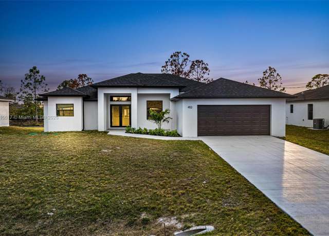 Property at 452 Mercedes Ct, Lehigh Acres, FL 33972, 4 beds, 2.5 baths