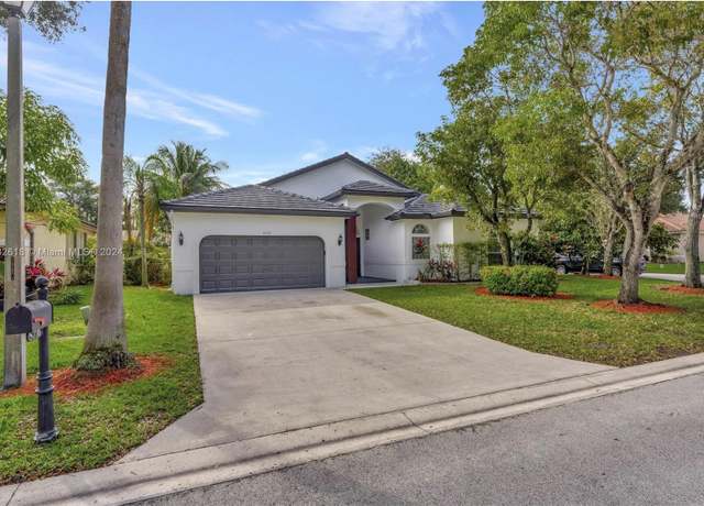 Property at 5776 NW 56th Mnr, Coral Springs, FL 33067, 4 beds, 2.5 baths