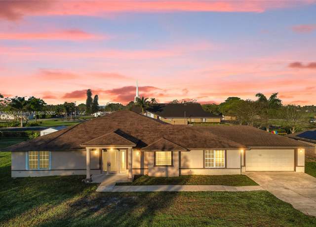 Property at 140 NE 7th St, Belle Glade, FL 33430, 4 beds, 4 baths