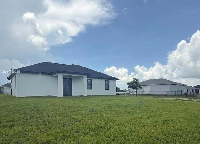 Property at 4218 SW 26th St, Lehigh Acres, FL 33976, 3 beds, 2 baths