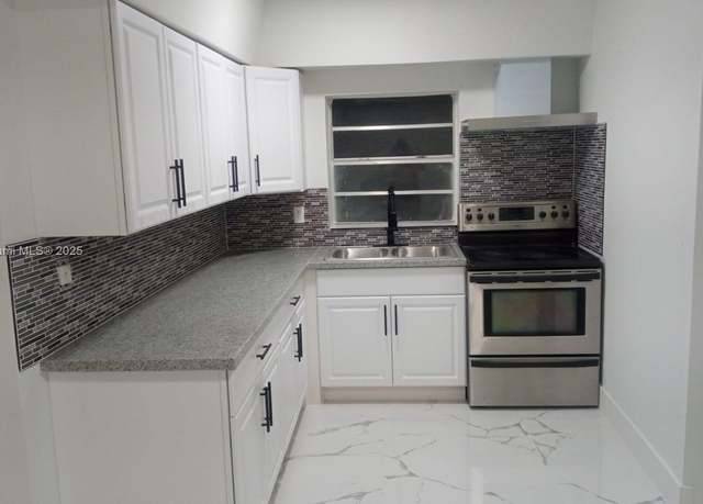 Property at 15660 NW 41st Ave, Miami Gardens, FL 33054, 3 beds, 2.5 baths