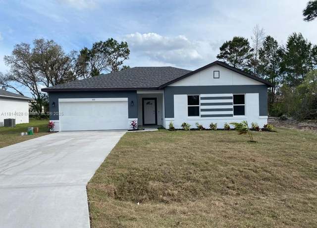 Property at 1040 Milwaukee Blvd, Lehigh Acres, FL 33974, 4 beds, 2 baths