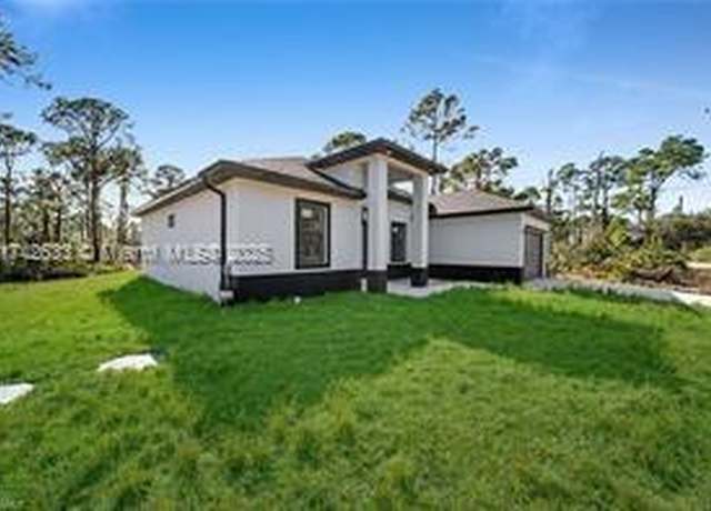 Property at 107 W 11th St, Lehigh Acres, FL 33972, 3 beds, 2 baths