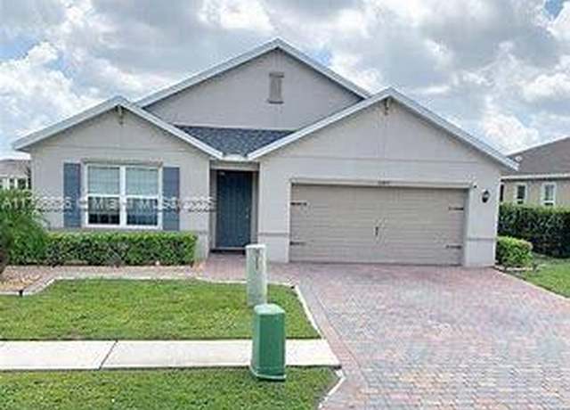 Property at 10817 Marble Brook Blvd, Lehigh Acres, FL 33936, 4 beds, 2 baths