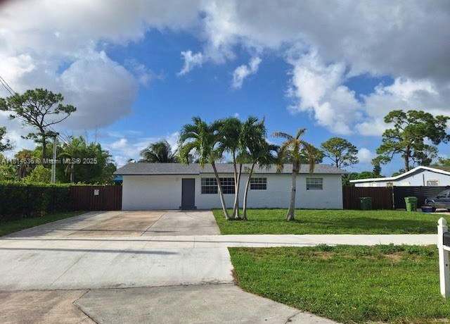 Property at 3961 Park Ln, Palm Springs, FL 33406, 4 beds, 3 baths
