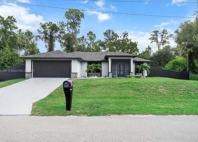 Property at 405 E 17th St, Lehigh Acres, FL 33972, 3 beds, 2 baths