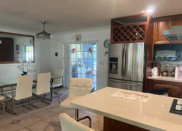 Property at 5001 Madison St, Hollywood, FL 33021, 5 beds, 4 baths