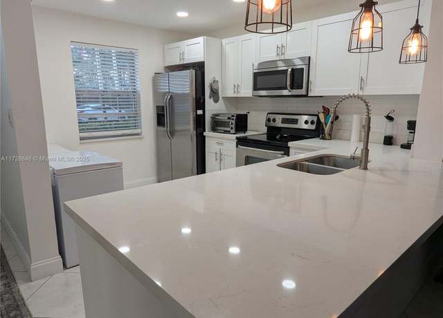 Property at 3910 Inverrary Blvd Unit 103-B, Lauderhill, FL 33319, 2 beds, 2 baths